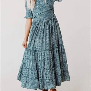 Lucy Avenue Hilda Dress, smocked, with pockets. This dress is new without tags.